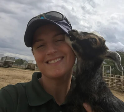 Whitney with baby goat