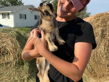 Nat with baby goat